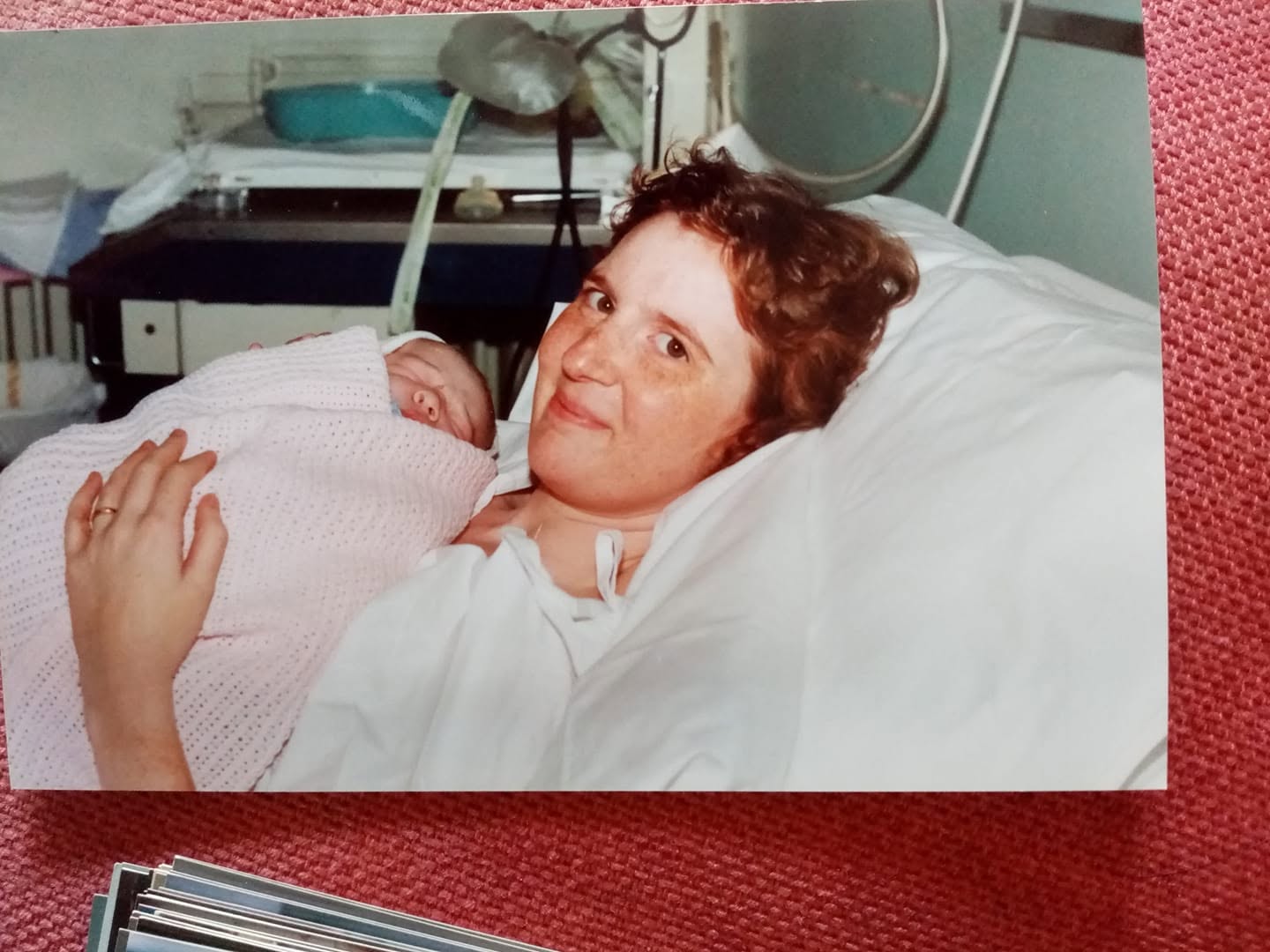 The Rabbit's mother holding the Rabbit as a newborn